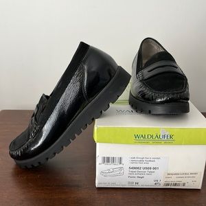 Black leather and suede loafers